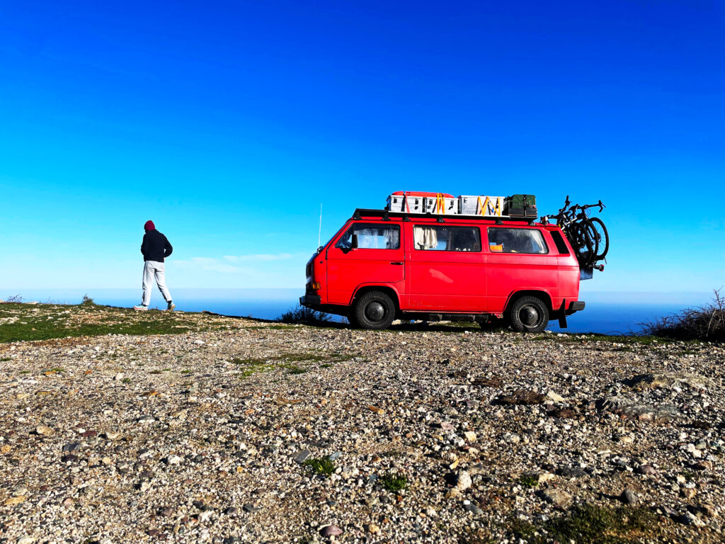 Jessy by the van with blue sky